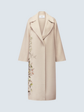 Вишукане бежеве вовняне пальто oui-ua.store з довгим силуетом, лацканами та витонченим квітковим принтом збоку