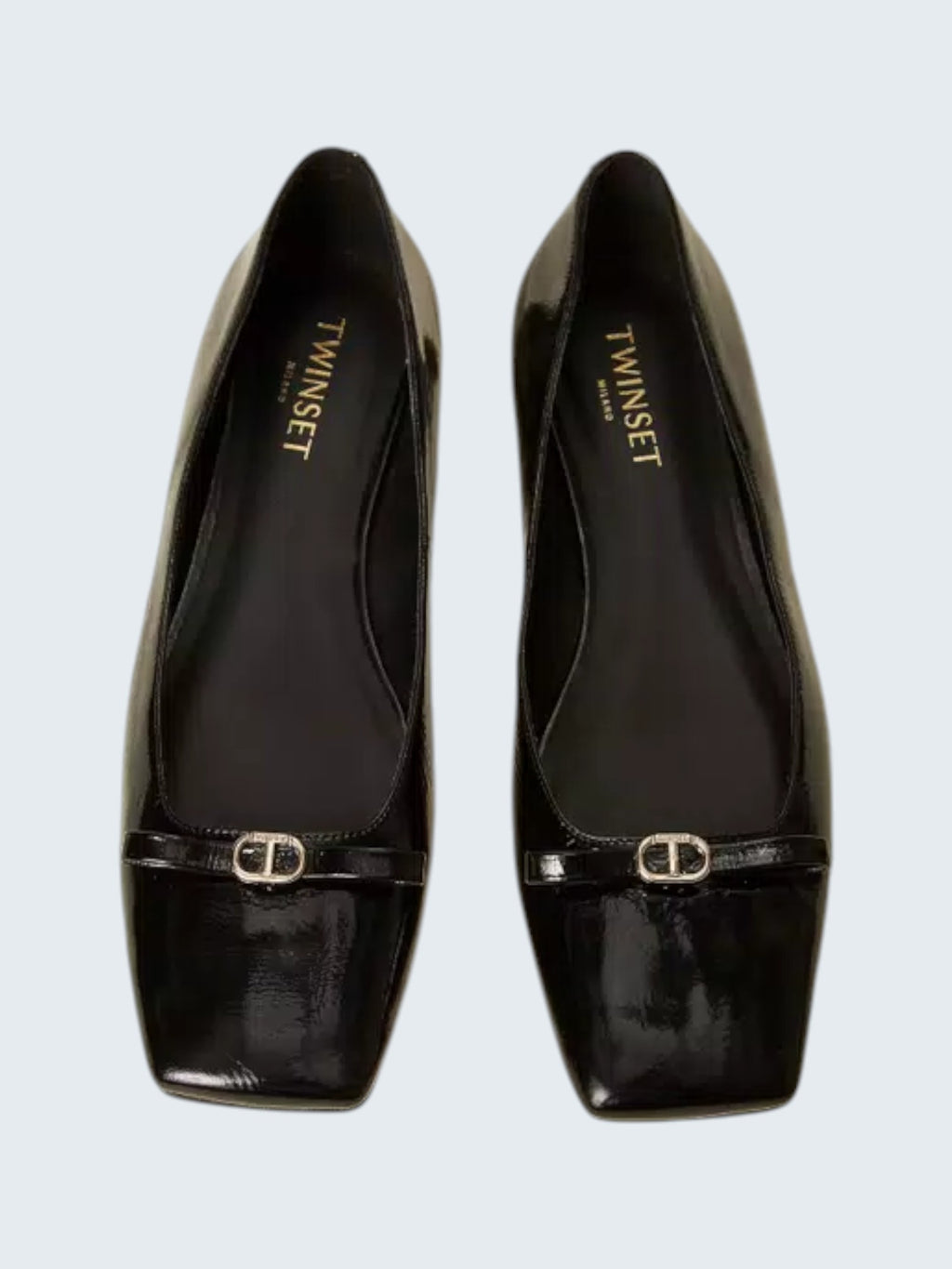 oui-ua.store black patent eco-leather ballet flats with decorative bow and Oval T logo detail, square toe, and low heel.