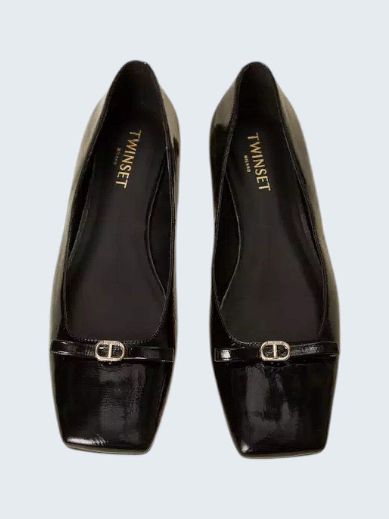 oui-ua.store black patent eco-leather ballet flats with decorative bow and Oval T logo detail, square toe, and low heel.