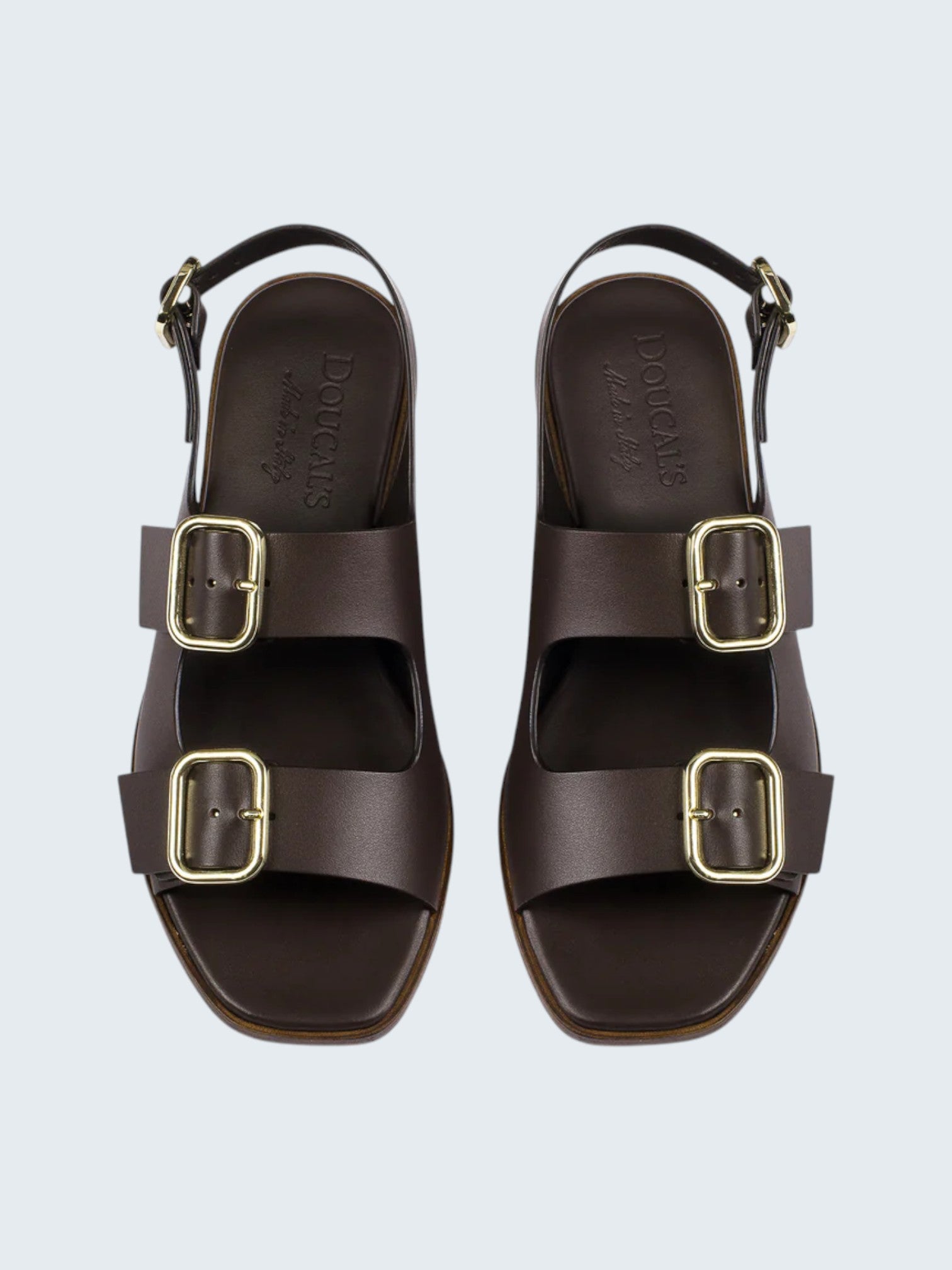 Oui-ua.store dark brown leather sandals with double gold buckles and adjustable ankle strap.