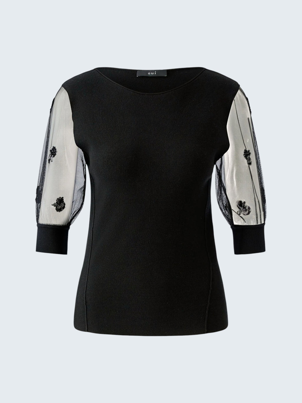 oui-ua.store black ribbed knit jumper with sheer mesh sleeves adorned with floral sequins. Round neck, short sleeves, and ribbed cuffs.