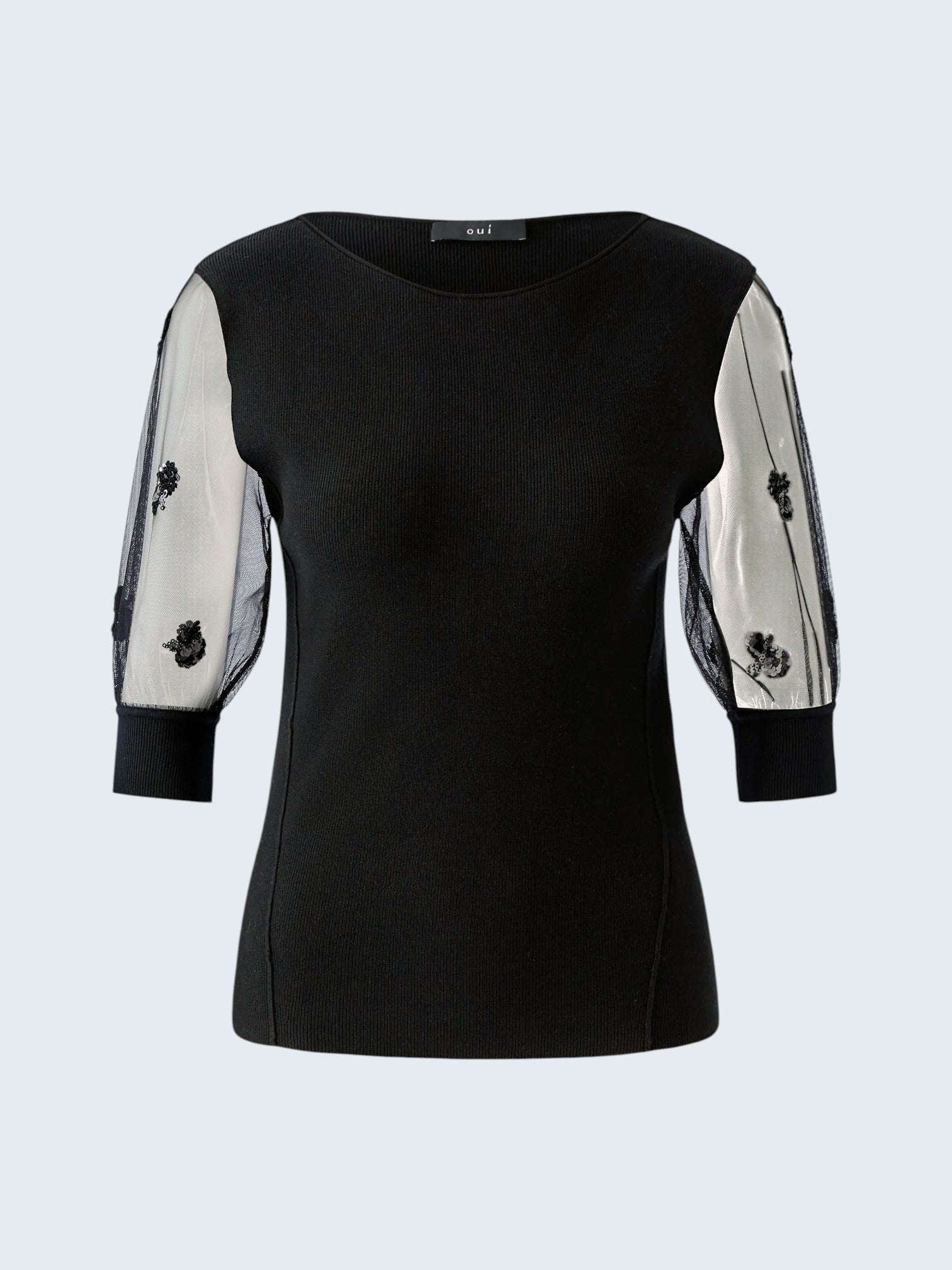oui-ua.store black ribbed knit jumper with sheer mesh sleeves adorned with floral sequins. Round neck, short sleeves, and ribbed cuffs.