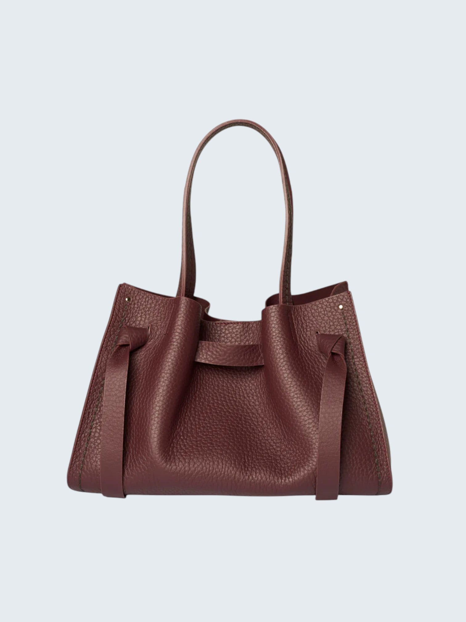oui-ua.store Bordeaux pebbled leather tote bag with top handles and a removable strap. Interior zip pocket.